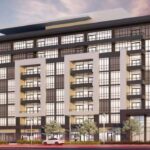 Exterior of 490 Plains Road East Condos at dusk.