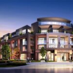 Exterior view of Parkcity Condominiums at dusk.